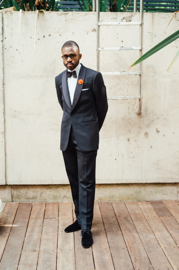man wearing la bowtique black tie tailoring mtm dinner suit